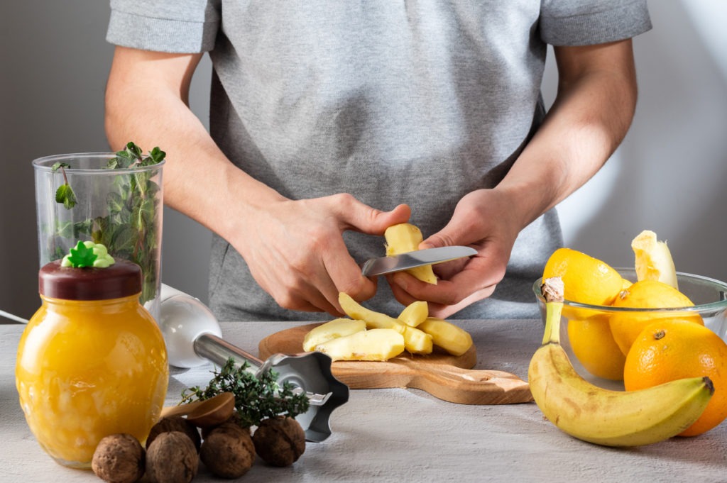 Peeling the fruit using a knife