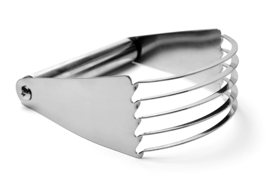 A stainless steel pastry mixer