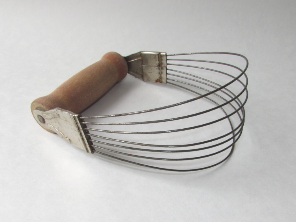 An antique pastry blender