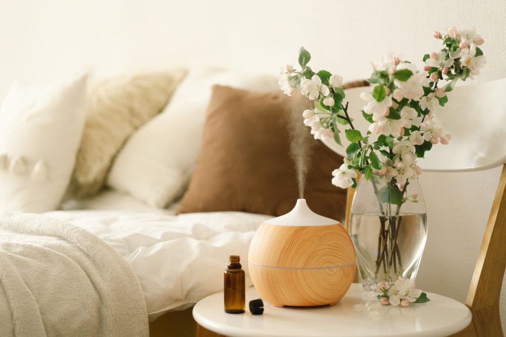 roma oil diffuser in a bedroom set up