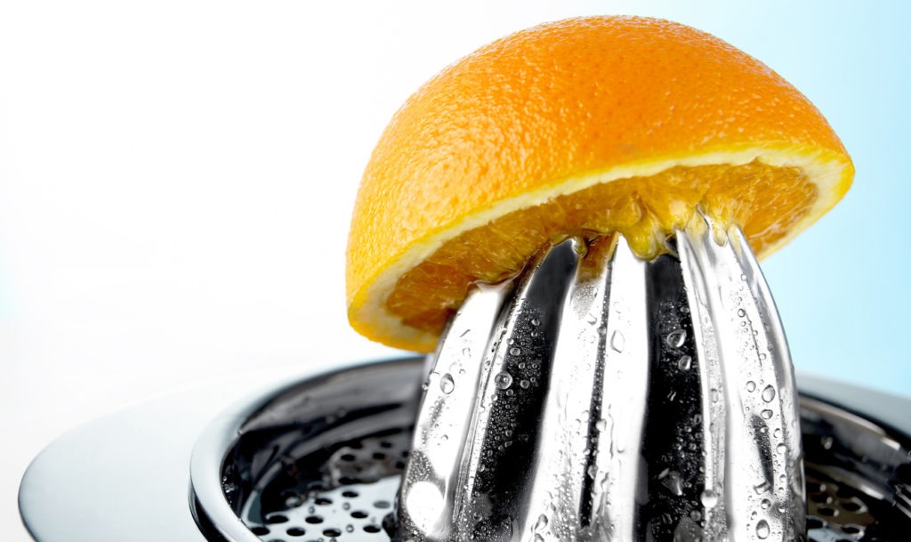 Squeezing half an orange
