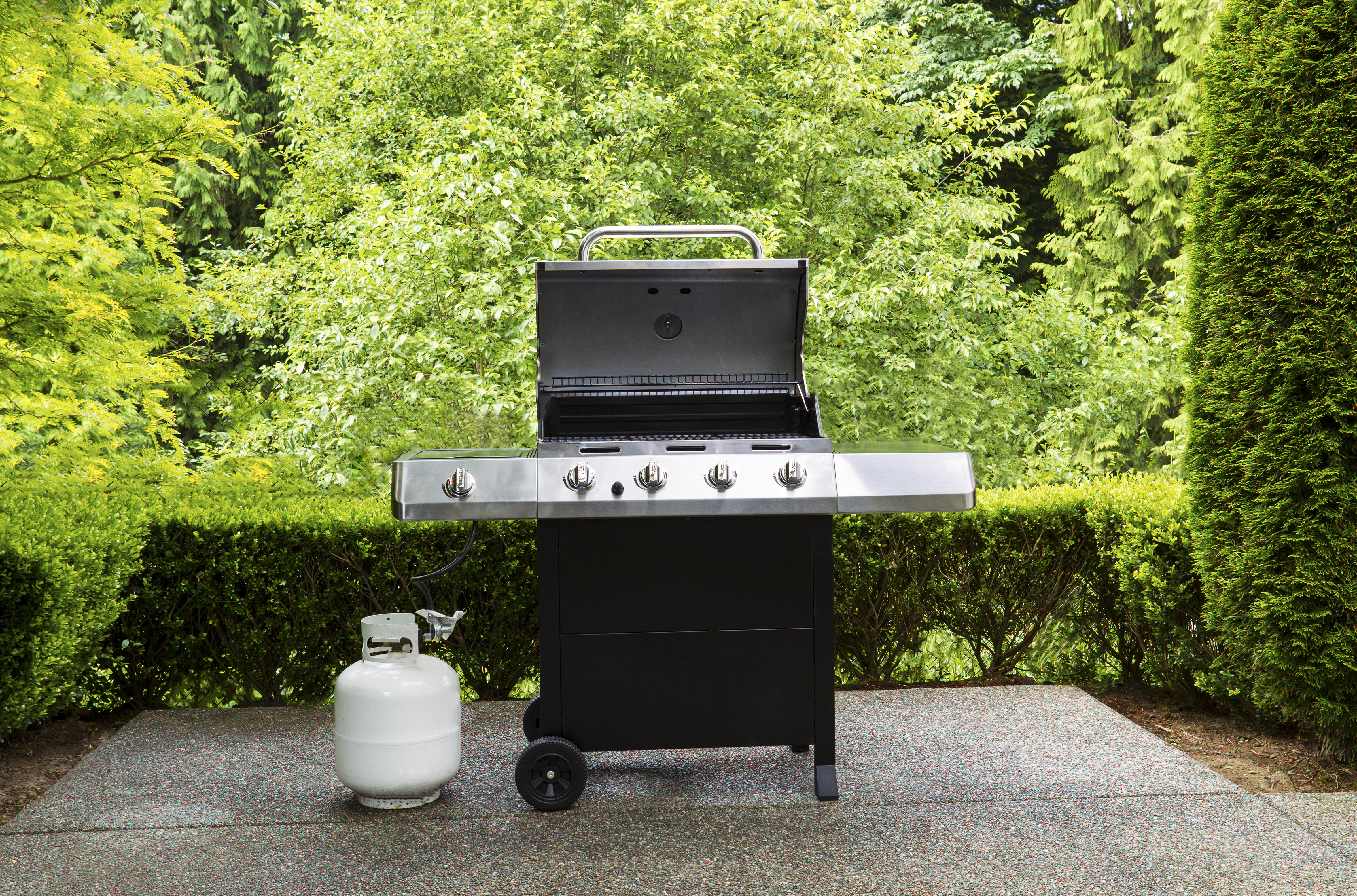 grill connected to a propane tank