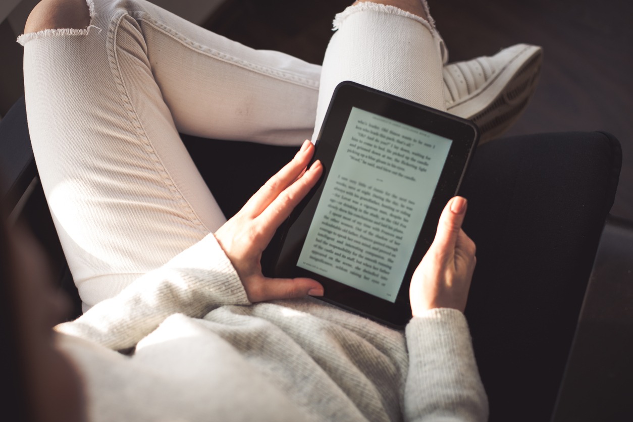 Woman with e-book