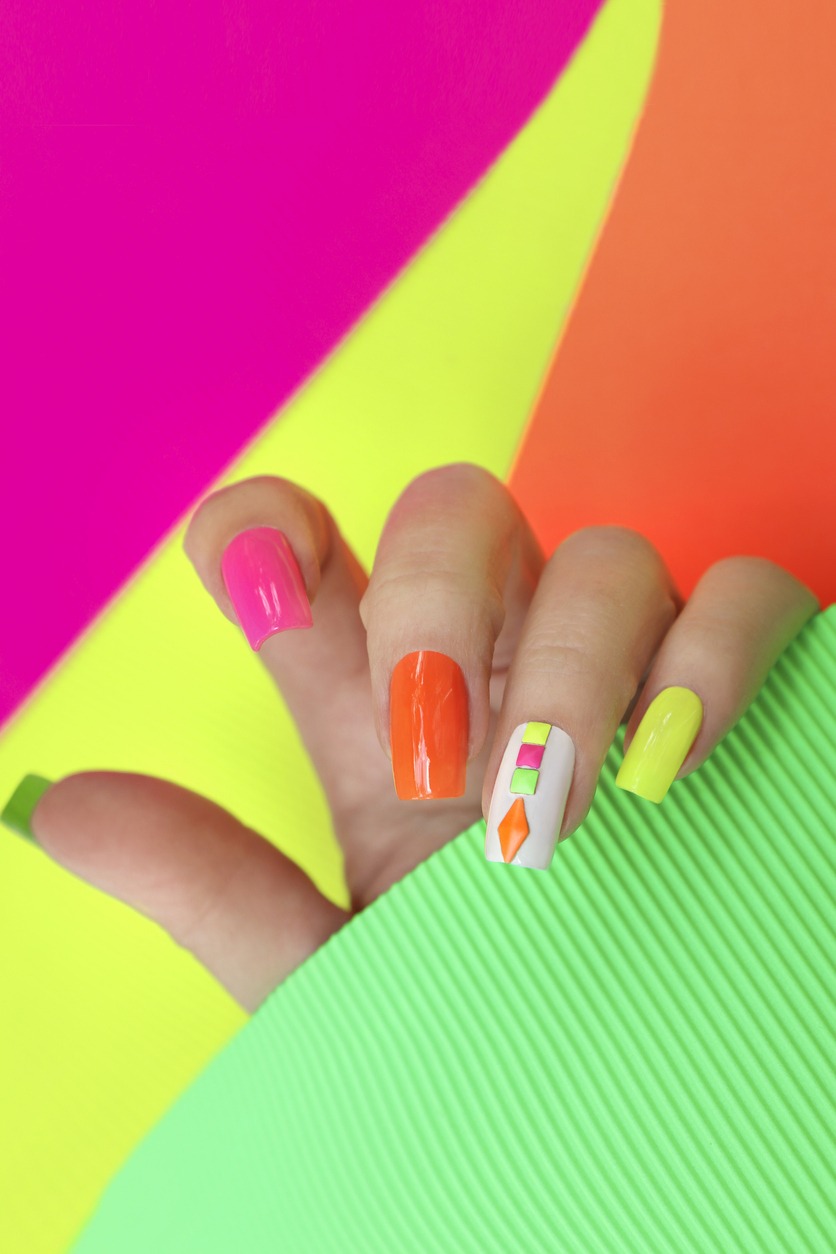 Bright illuminated multicolored manicure