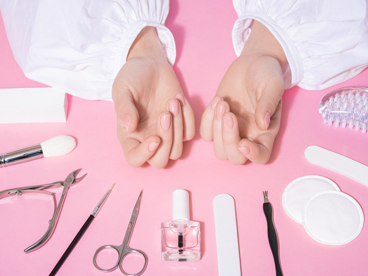 Nail salon close up of female well-groomed hands