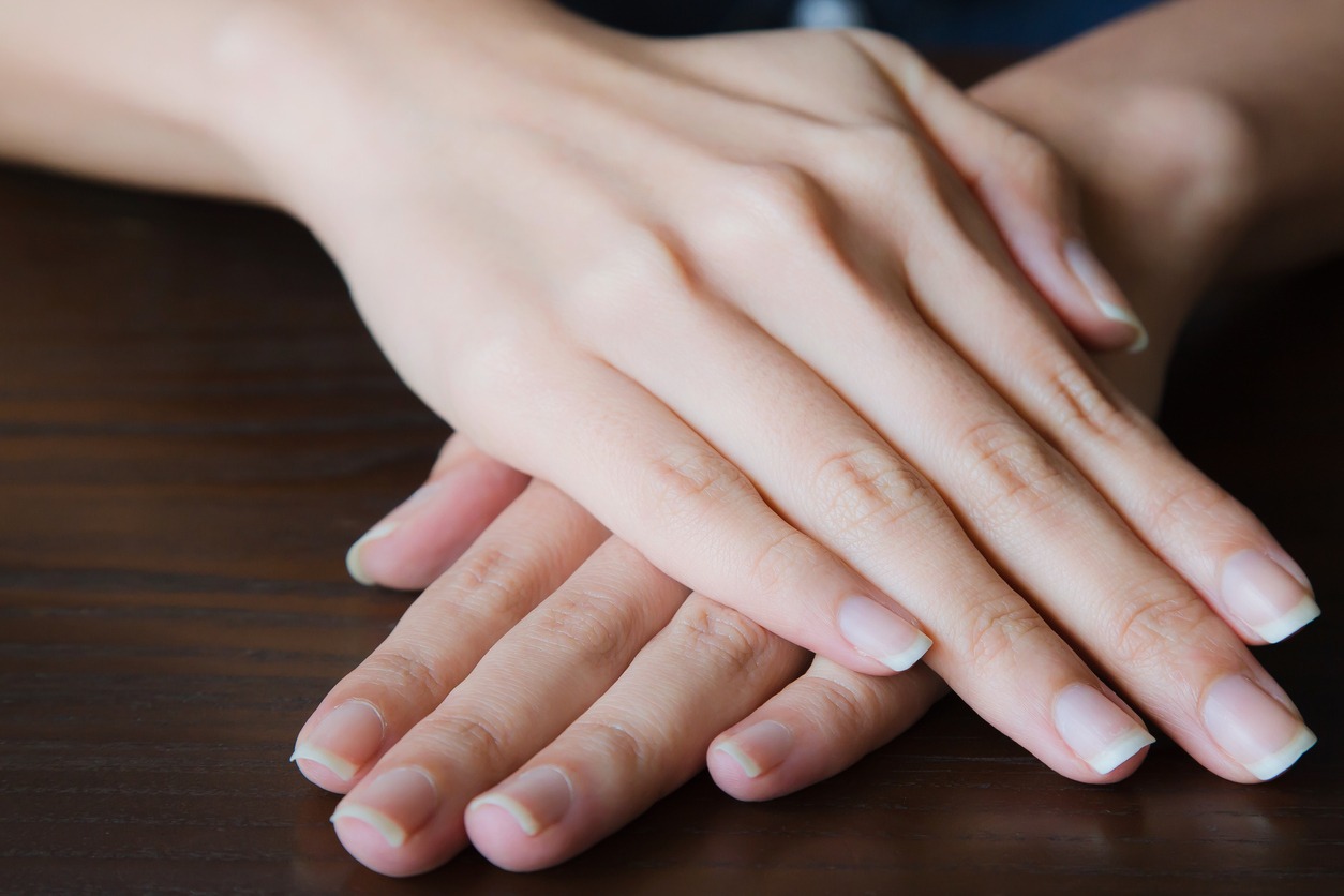 Woman hands showing with beautiful manicure
