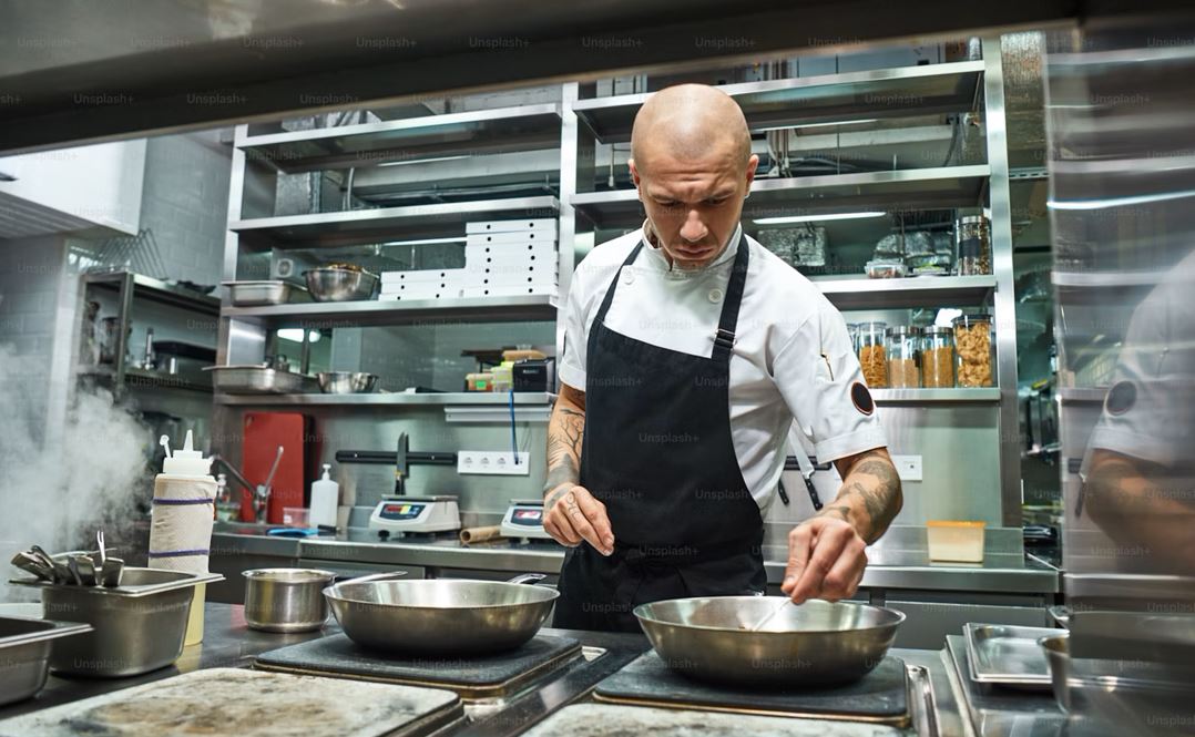 male chef with several
