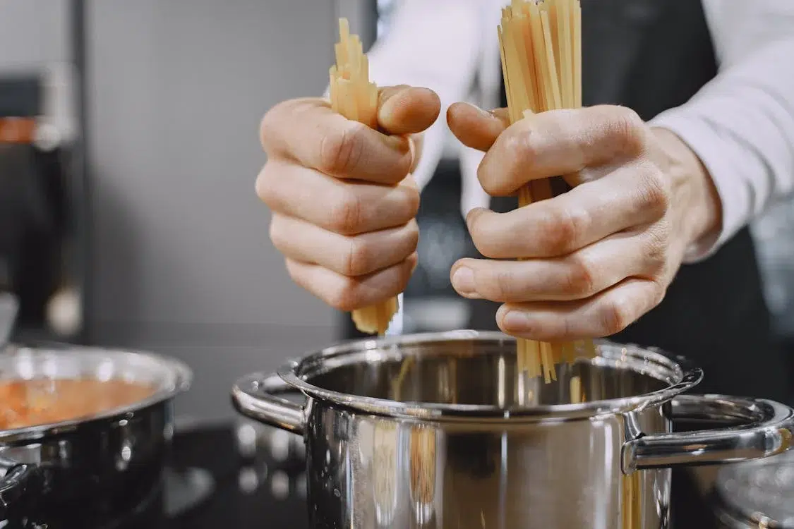 putting pasta