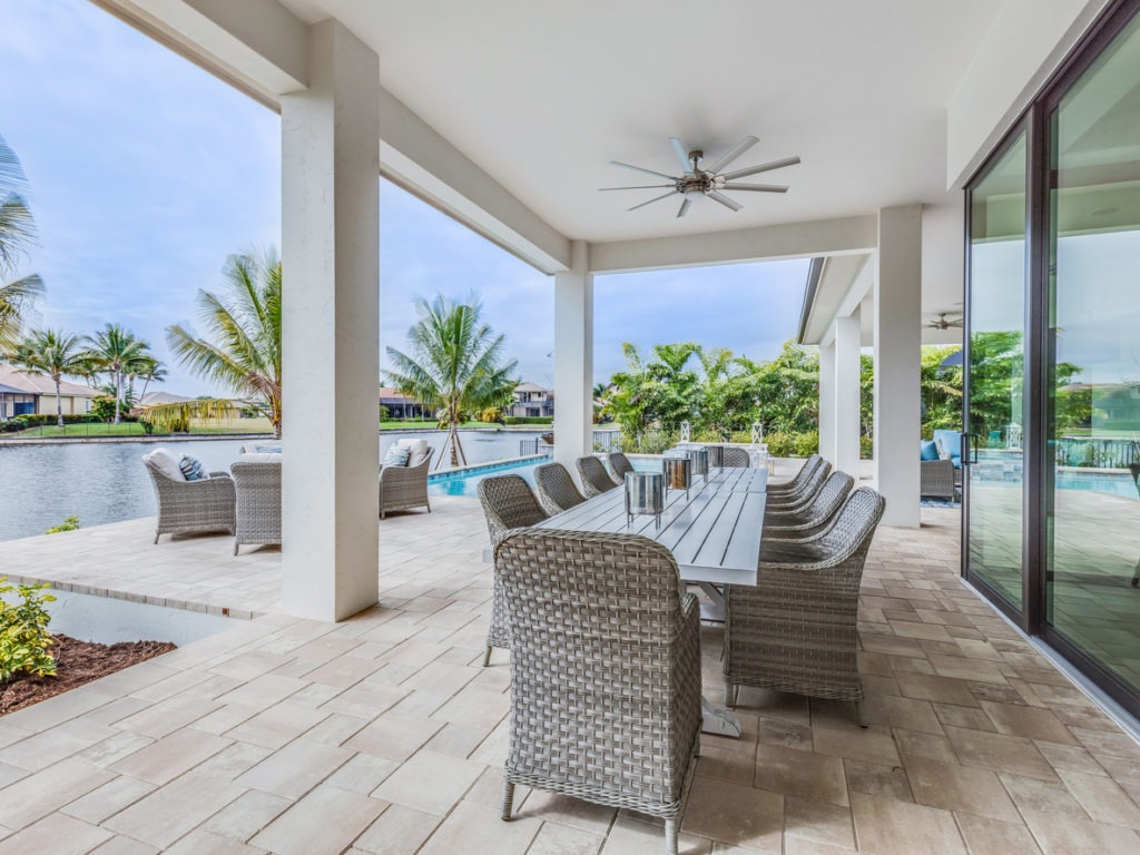 an outdoor space with a ceiling fan