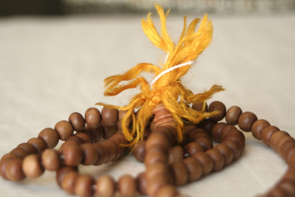 a close up of sandalwood bracelets