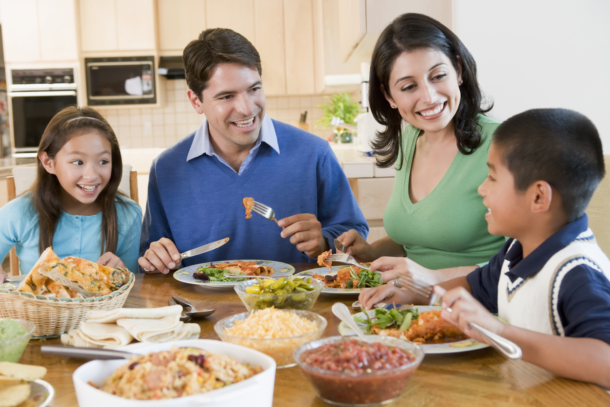 Family enjoying meal Tex-Mex meal together