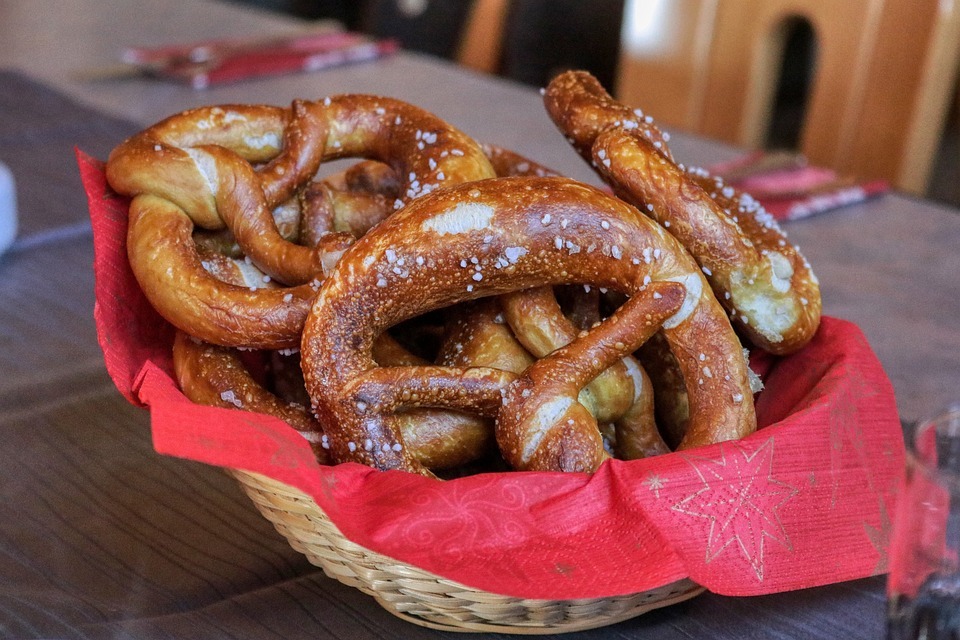 A bowl of pretzels wrapped in red paper