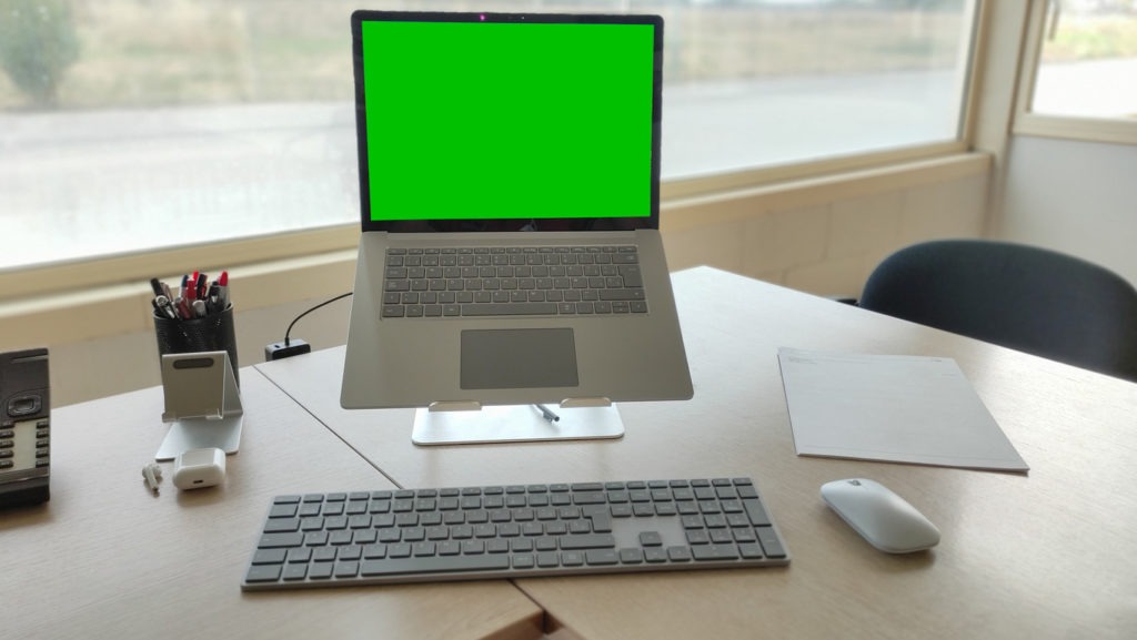 Laptop placed on tilted stand