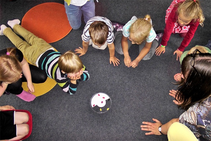 Children playing in kindergarten class