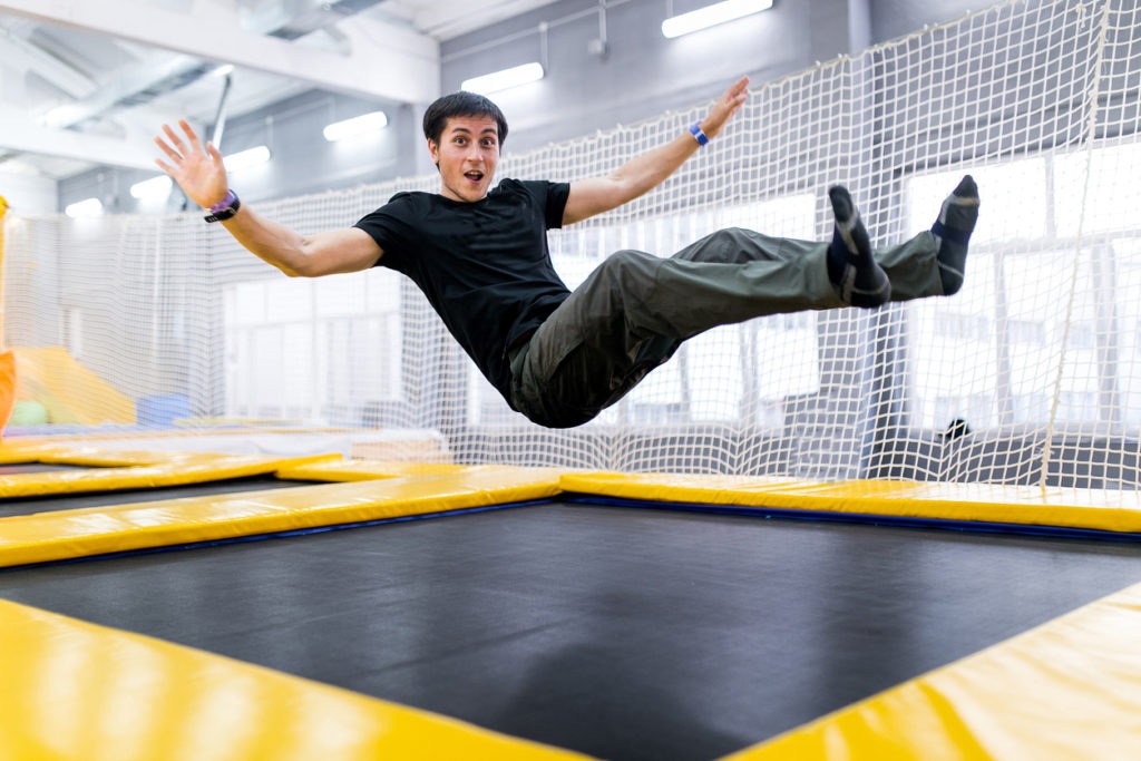 A young man trampolining
