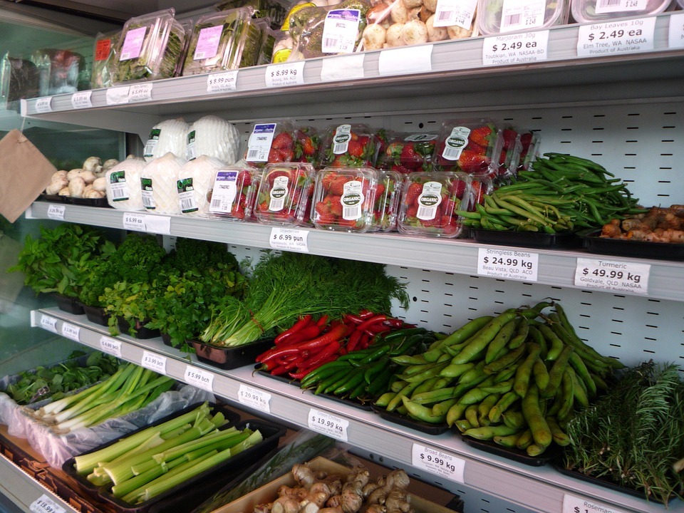 shelves of organic fruits and vegetables