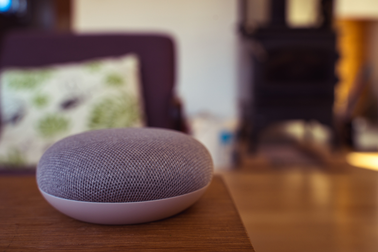 Voice controlled smart speaker in an interior home environment
