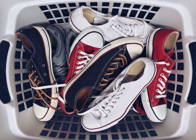 a basket full of retro sneakers