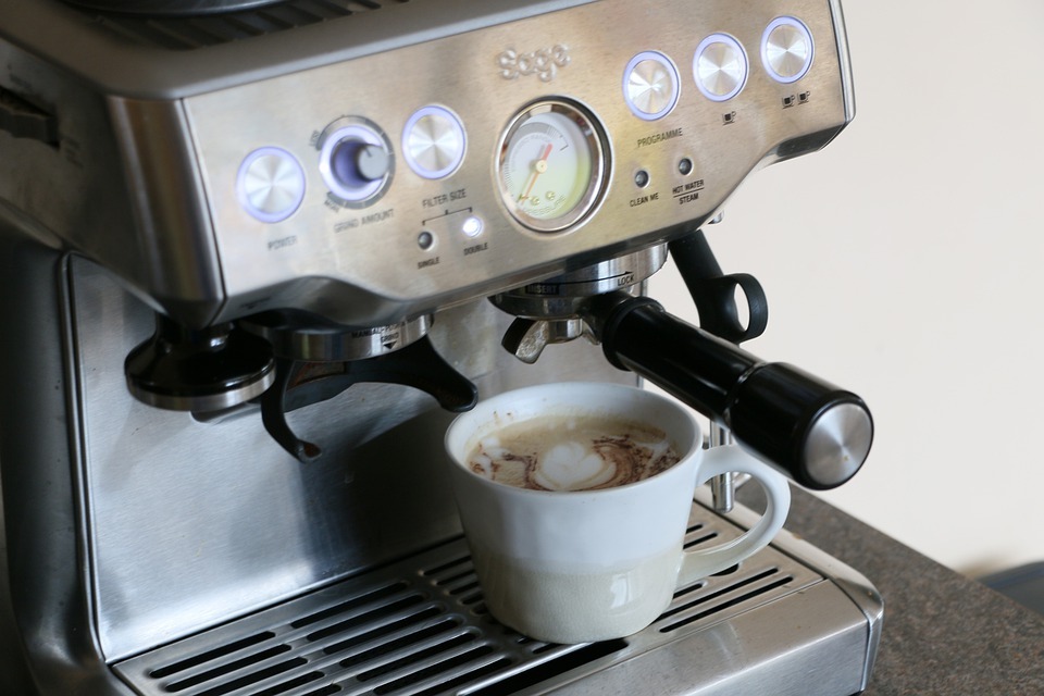 espresso machine and cup of coffee