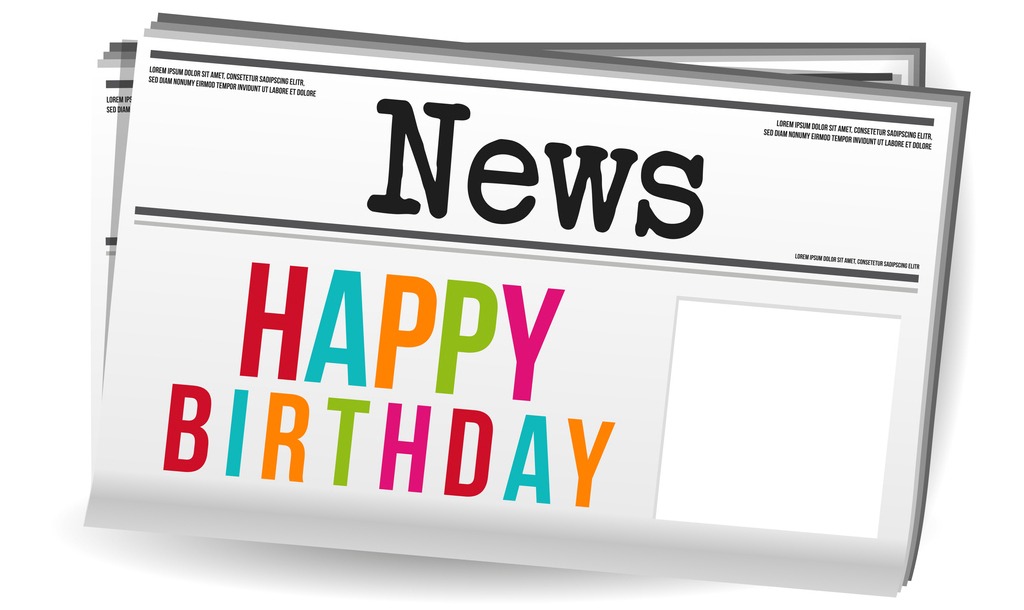 happy birthday greetings in a newspaper on a white background