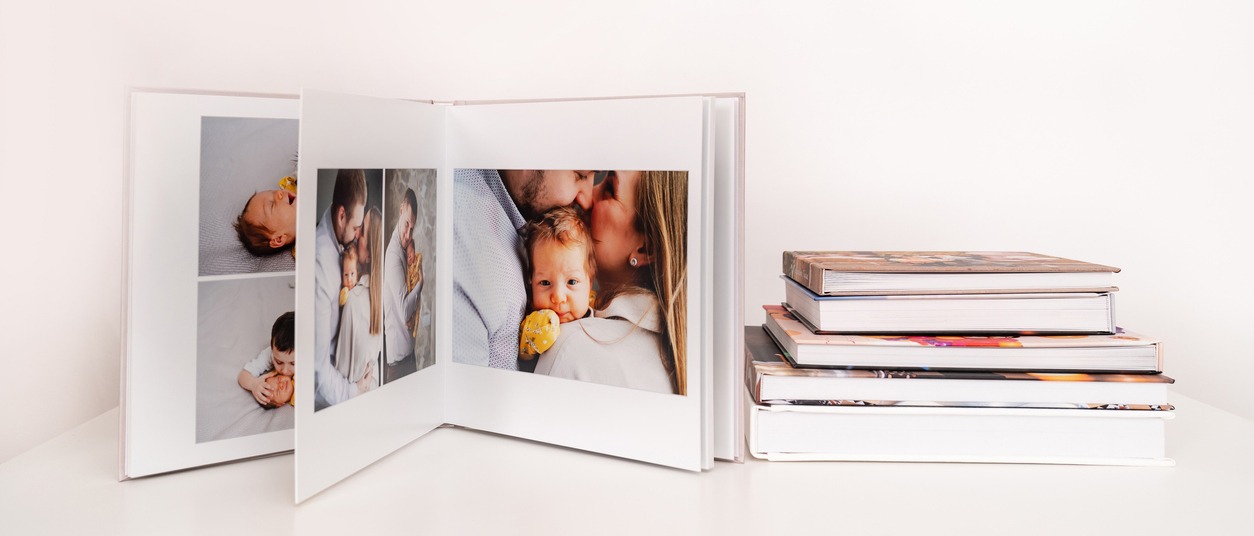 open photobook in a flesh color background