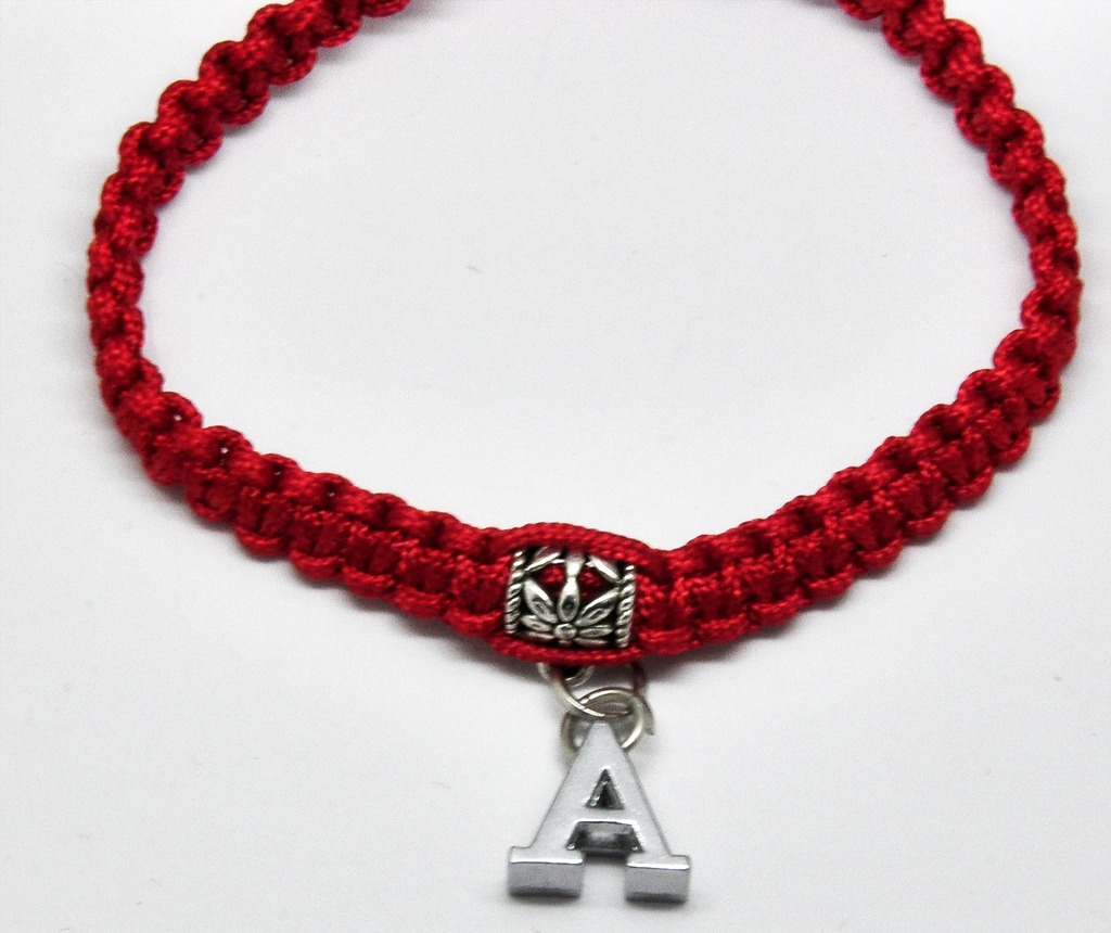 red braid bracelet with initial in a white background