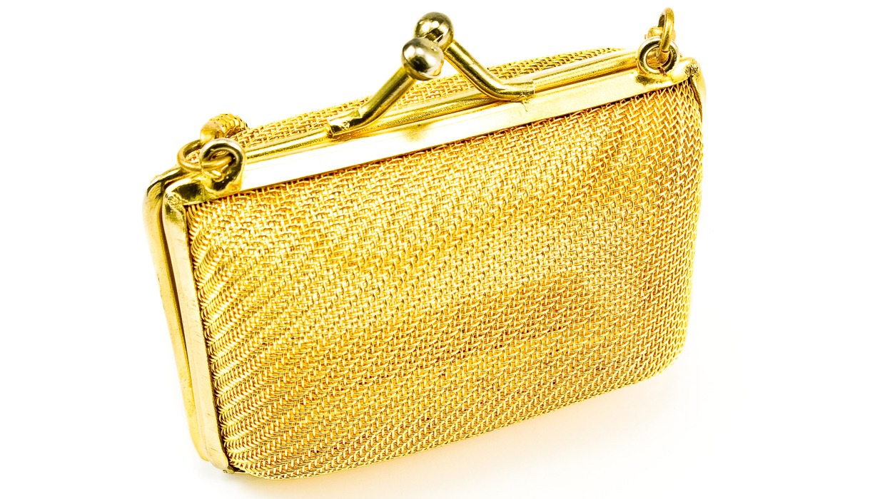 golden purse in white background