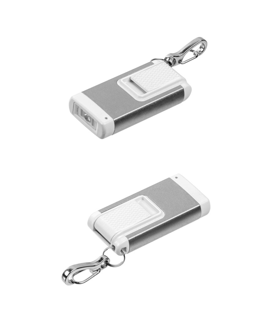 USB flashlight keychain.Metal LED flashlight isolate on a white background. Pocket lamp for dark time of day or dark rooms