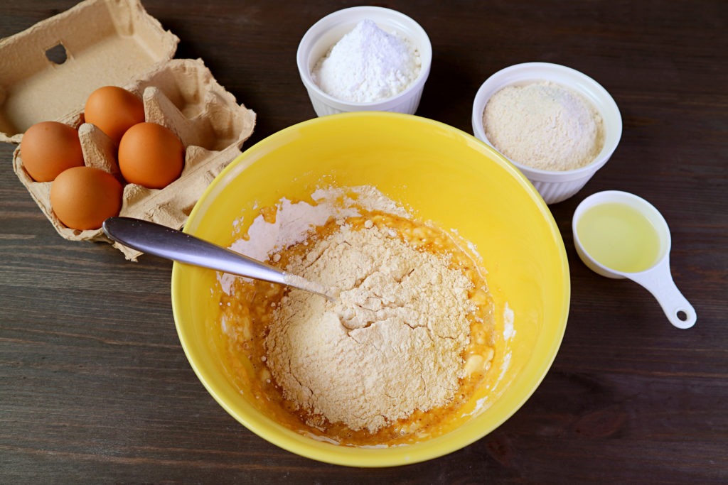 Mixture-in-Mixing-Bowl-and-with-Another-Ingredients-for-Baking-Whole-Wheat-Cake