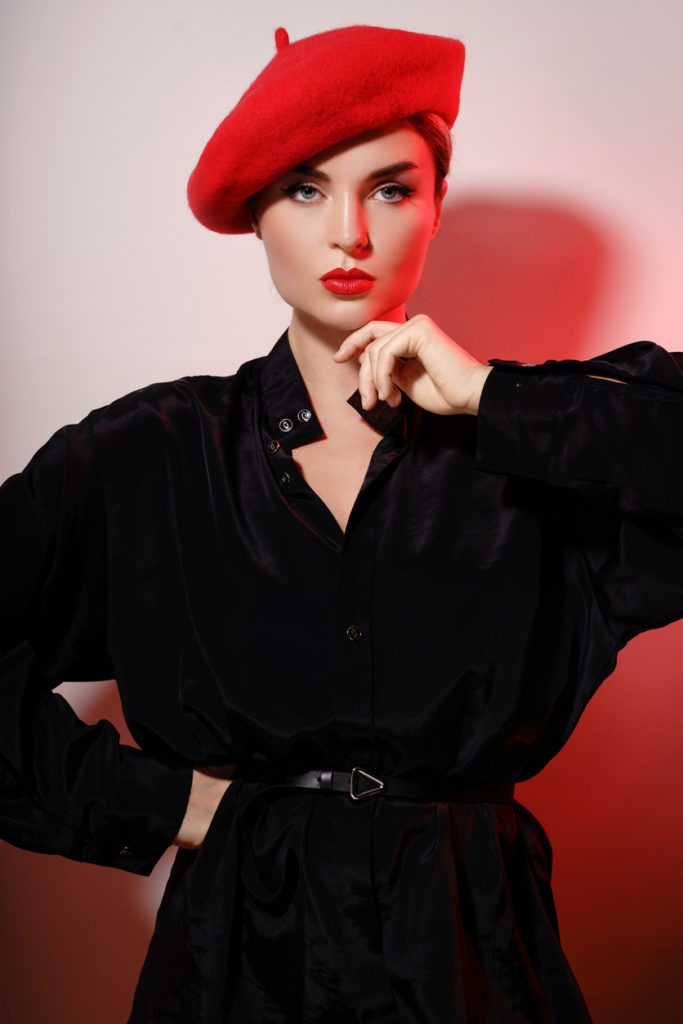 A fashionable woman wearing a beret