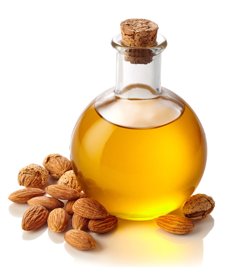Almond oil bottle, isolated on a white background 