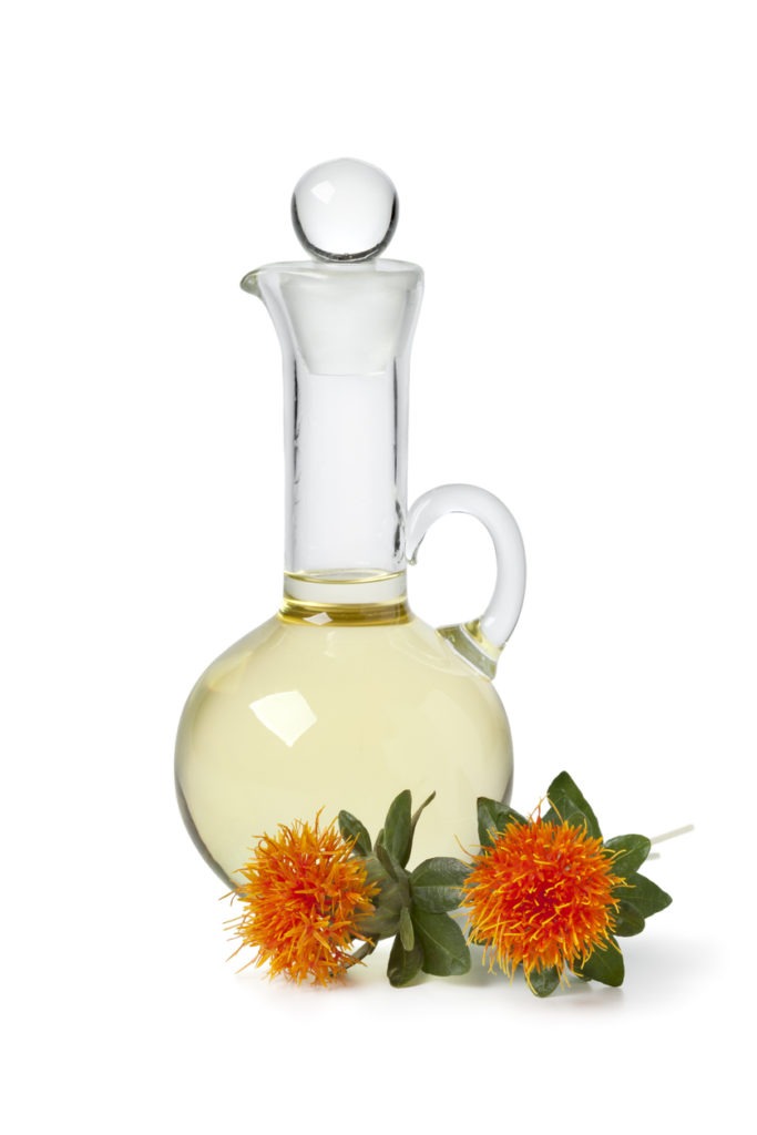 Safflower oil bottle on a white background. 