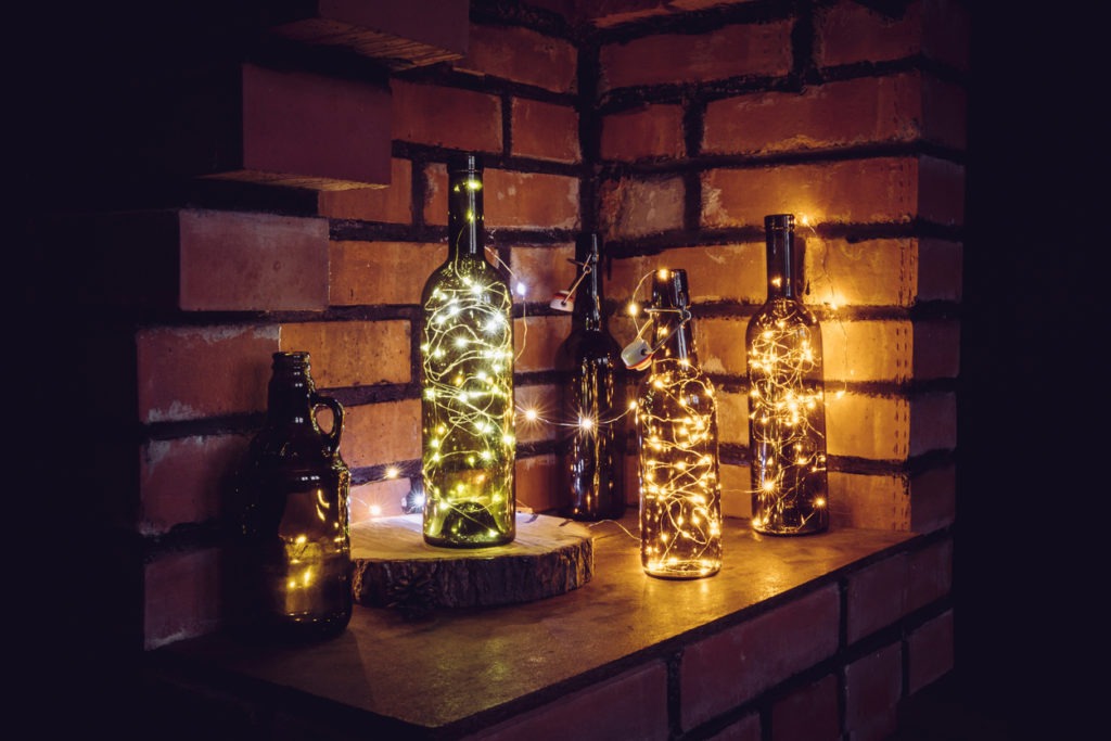 Vintage bottles decorated with micro led lights