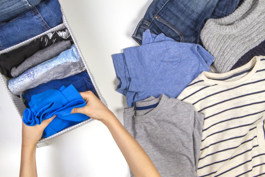 Vertical storage of clothing, tidying up, room cleaning concept