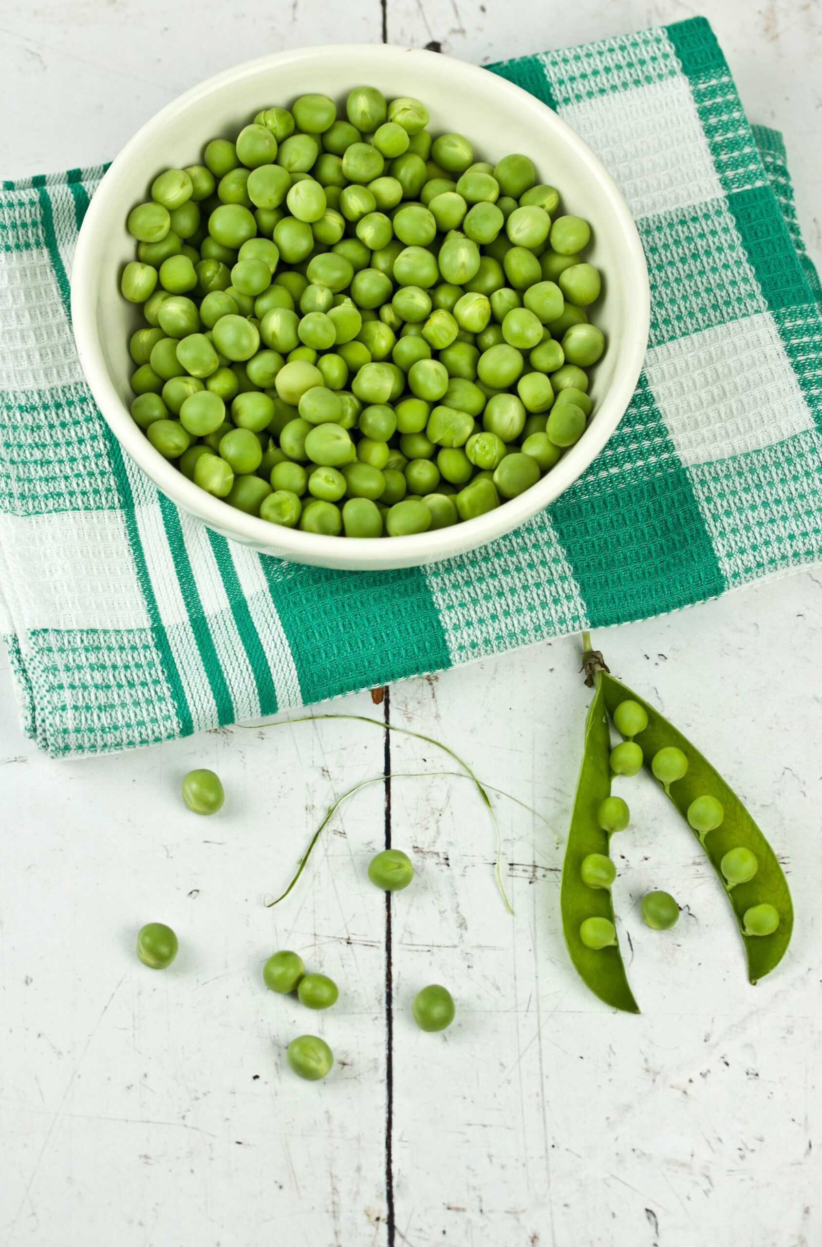 a close up of frozen peas