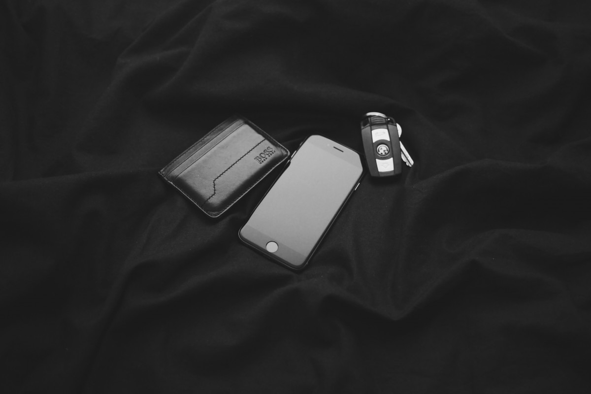 wallet, keys, a mobile phone kept together