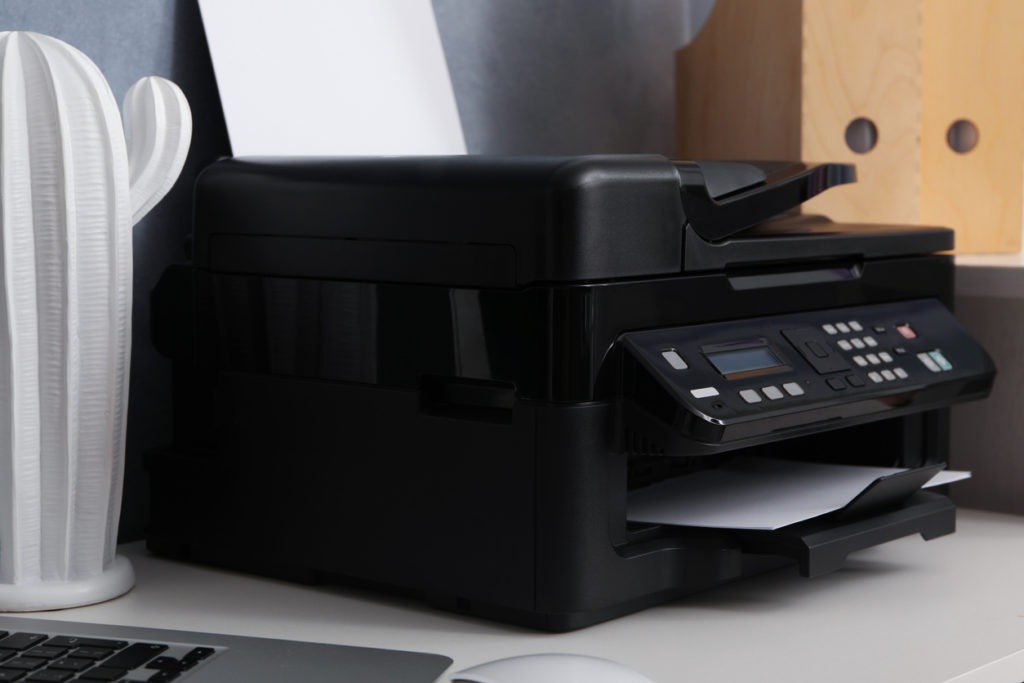 A desktop scanner on top of a table