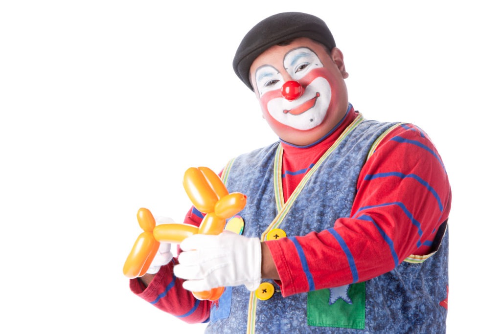 Balloon animal making by clown performer