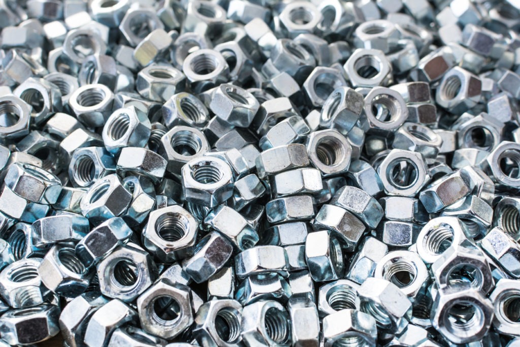 A bunch of fasteners lying together
