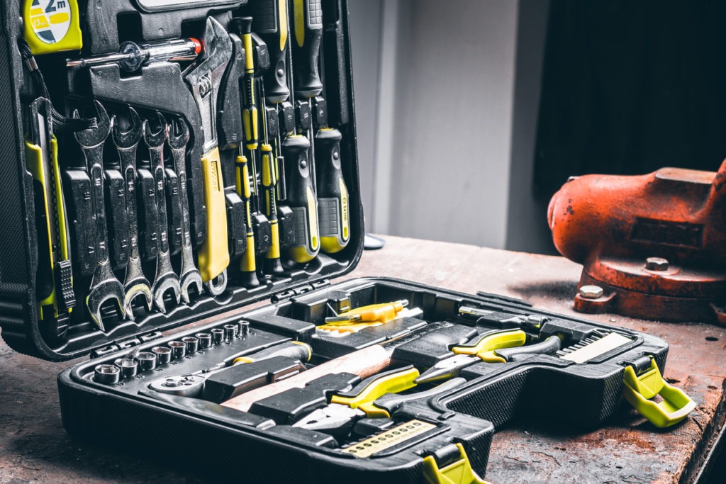 A toolbox with many types of tools inside
