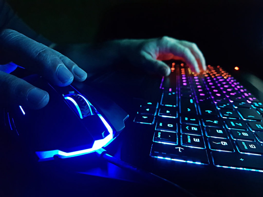 Gaming Keyboard, Gamer using a Gaming Keyboard