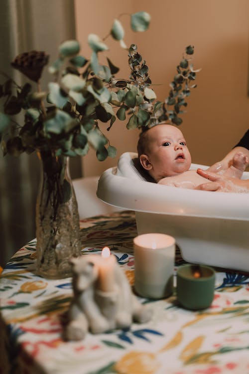 a-baby-in-a-white-bath-tub