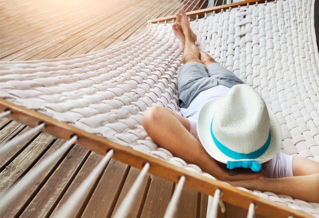 Man in a hammock on summer day