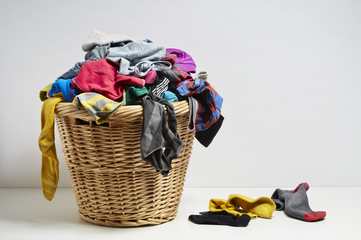 dirty clothes in a basket