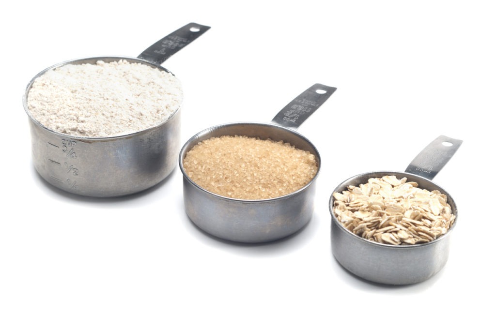 Measuring cups filled with dry ingredients
