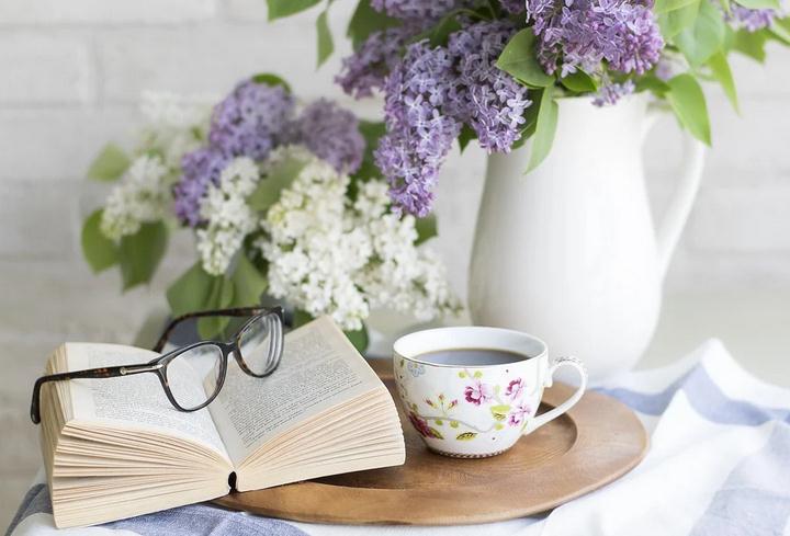 A-book-with-glasses-and-flowers