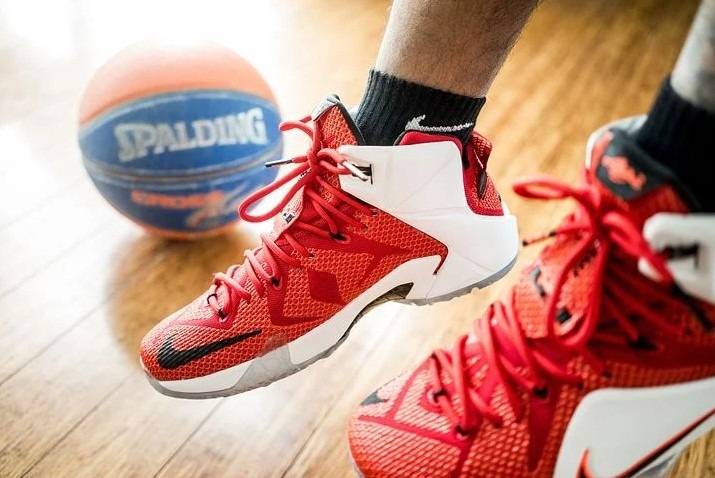A pair of red basketball shoes