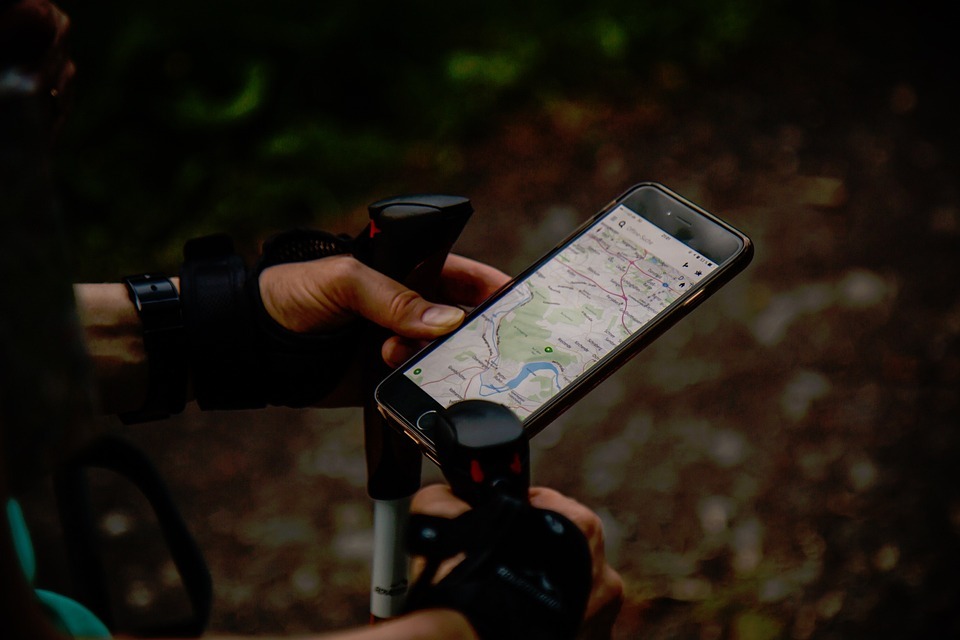 A person using GPS map phone