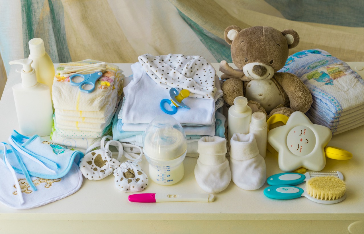 A set of baby clothes and accessories