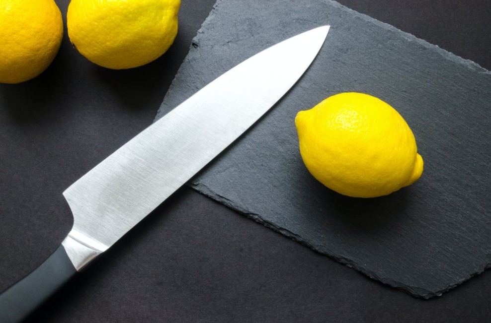 a-kitchen-knife-with-some-lemons